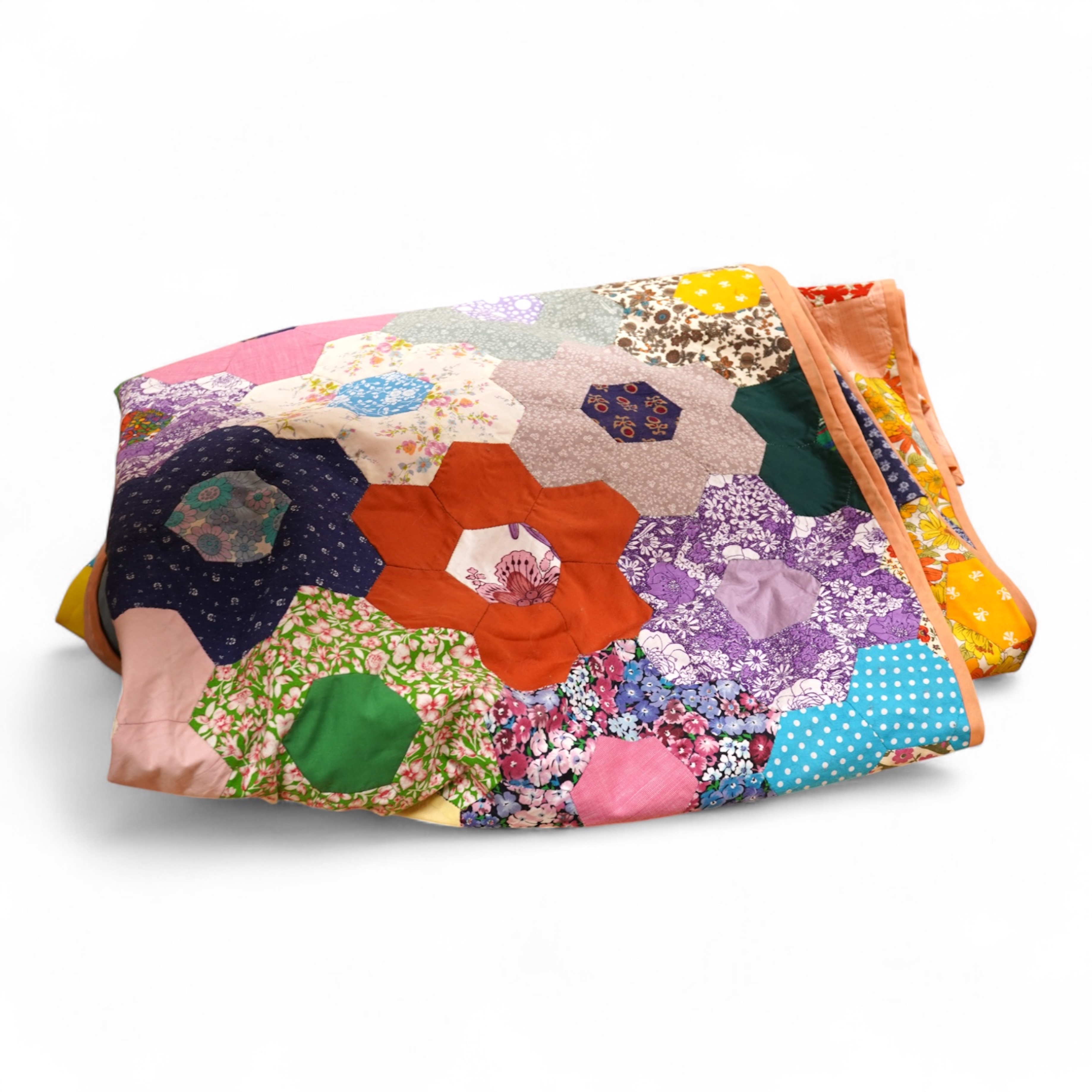 A mid 20th century patchwork quilt